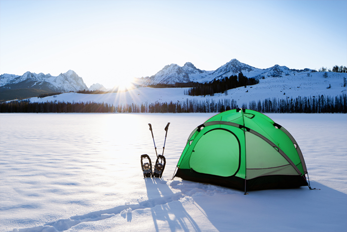 green tent on iced lake